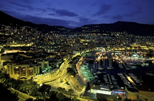 Images Dated 5th October 2004: Europe, Monaco. View of port looking towards Monte Carlo, evening