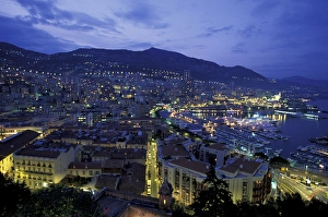 Images Dated 5th October 2004: Europe, Monaco. View of port looking towards Monte Carlo, evening