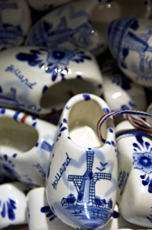 Europe, The Netherlands (aka Holland), Amsterdam. Souvenir blue Delft wooden shoes