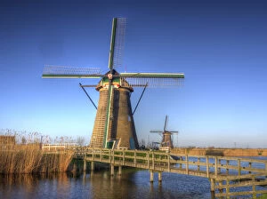 Netherlands, Holland Gallery: Europe; Netherlands; Kinderdijk; Sunrise along the canal with Windmills