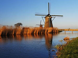 Netherlands, Holland Gallery: Europe; Netherlands; Kinderdijk; Evening Light along the canal with Windmills