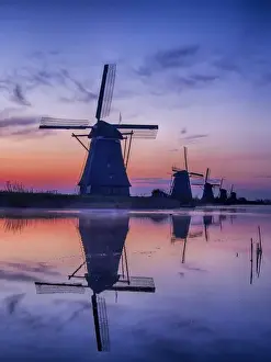 Netherlands, Holland Prints: Europe; Netherlands; Kinderdijk; Sunrise along the canal with Windmills