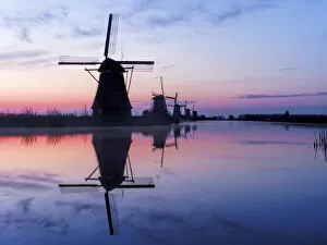 Netherlands, Holland Gallery: Europe; Netherlands; Kinderdijk; Windmills at Sunrise along the canals of Kinderdijk