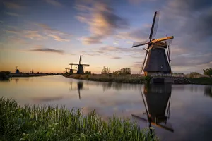Windmill Prints: Europe, The Netherlands. Kinderdijk windmills at sunset
