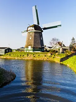 Netherlands, Holland Prints: Europe; Netherlands; Nord Holland; Windmill along canal of Nord Holland
