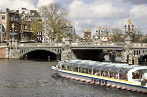 Images Dated 14th April 2008: Europe, Netherlands, South Holland, Amsterdam, River Amstel tourist in river boat