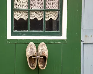 Images Dated 5th November 2020: Europe, Netherlands, Zaanse Schans. Wooden shoes on wall outside village house