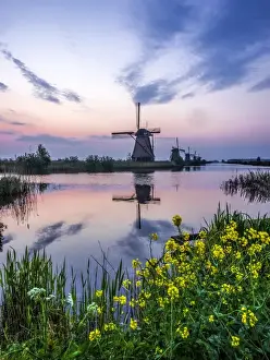 Netherlands, Holland Prints: Europe; Netherleands; Kinderdyk; Windmills at Sunrise along the canals of Kinderdijk