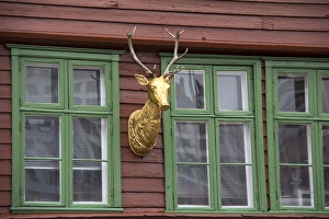 Hanseatic League Prints: Europe, Norway, Bergen. Bryggen facade deer, a UNESCO World Heritage Site