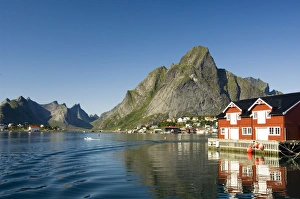 Images Dated 31st July 2006: Europe, Norway, Lofoten. The town of Reine below Olstinden