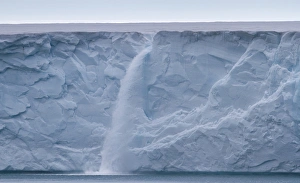 Images Dated 13th July 2012: Europe, Norway, Spitsbergen, Svalbard. Waterfall of surface meltwater flows off top