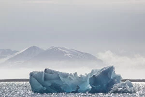 Norway Gallery: Europe, Norway, Svalbard. Backlit blue glacial ice