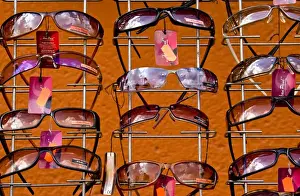 Vendor Prints: Europe, Poland, Gdansk. Sunglasses on display in shop on River Motlawa waterfront