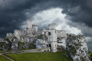 Poland Prints: Europe, Poland. Storm clouds over Ogrodzieniec Castle