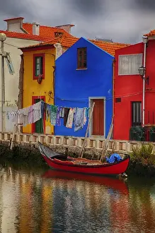Images Dated 1st July 2011: Europe; Portugal; Averio; Moliceiro Boats Along the main canal of Averio With Night Lights