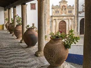 Ledge Prints: Europe, Portugal, Obidos. Ceramic pots adorn a ledge along a building