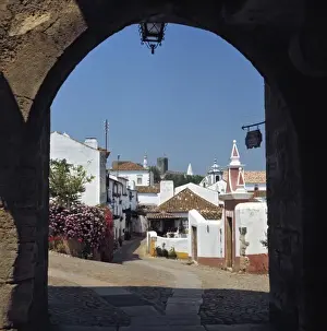 Obidos Prints: Europe, Portugal, Obidos. The colorful village of Obidios NM, in Portugal, is seen