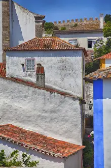 Images Dated 30th June 2011: Europe; Portugal; Obidos; Elevated View of the town with the Red Roofs and special architecture