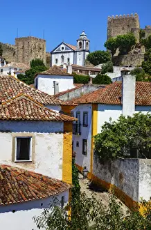 Images Dated 30th June 2011: Europe; Portugal; Obidos; Elevated View of the town with the Red Roofs and special architecture