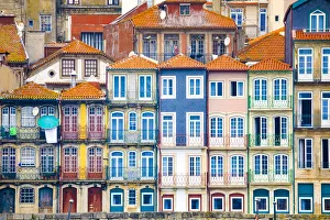 Prints of Europe, Portugal, Porto. Colorful building facades next to Douro River. Credit as: Jim Nilsen / Jaynes Gallery / DanitaDelimont.com Images Dated 2018 December: Europe, Portugal, Porto. Colorful building facades next to Douro River. Credit as