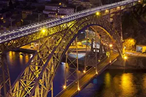Douro River Prints: Europe, Portugal, Porto. Dom Luis I Bridge lit at night