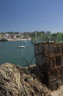 Images Dated 3rd June 2010: Europe, Portugal. Seaside city of Cascais, coastal view from pier with fish traps