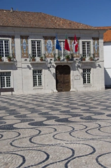 Europe, Portugal. Seaside city of Cascais. Historic City Square and City Hall, wave