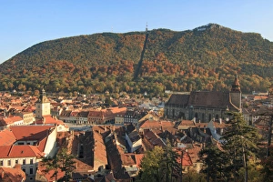 Romania Gallery: Europe, Romania, Brasov. City signage. Poarta Schei district. Looking out over forested park