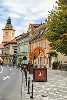 Brasov Prints: Europe, Romania, Brasov, Street scene from Council Square. Clock tower