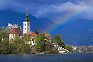 Images Dated 21st April 2012: Europe, Slovenia, Lake Bled. Rainbow over lake and church