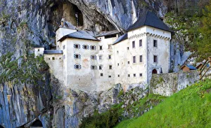 Slovenia Prints: Europe, Slovenia, Predjama Castle. Castle built into mountain wall