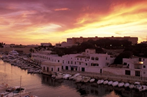 Images Dated 31st August 2011: Europe, Spain, Balearics, Menorca, Ciutadella. Sunset over harbor