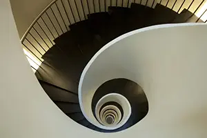 Staircase Prints: Europe Spain, Bilbao. Spiral staircase in the Silken Gran Hotel Domine. Credit as