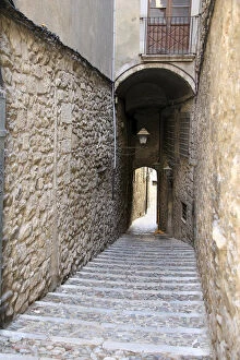 Europe, Spain, Girona. Steps of walkway and tunnel in Girona