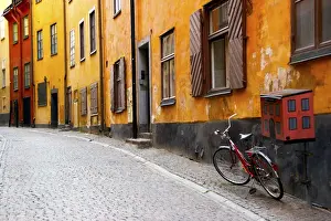 Bicycle Prints: Europe, Sweden, Stockholm. Street scene in Gamla Stan (Old Town) section with bicycle