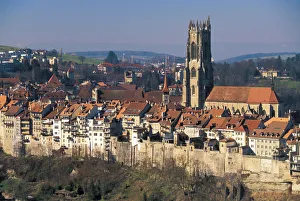 Images Dated 31st August 2011: Europe, Switzerland, Fribourg. Cathedral St. Nicholas and city wall