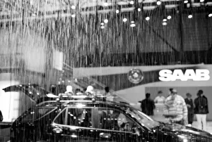 Black And White Prints: Europe, Switzerland, Geneva. Geneva Motor Show; artificial rain at the Saab exhibit