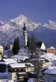 Images Dated 7th June 2004: Europe, Switzerland, Graubunden, Ftan Village. Winter afternoon in town with Unterengradin