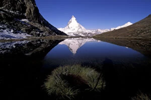 Images Dated 21st October 2004: Europe, Switzerland, Zermatt Region. The Matterhorn reflected in Riffelsee
