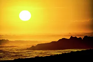 Images Dated 5th January 2023: Each evening the incredible colors of the setting sun becomes a tourist mecca on the beaches of Bali