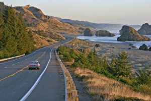 Images Dated 1st January 1980: Evening lighting car on highway 101 near Gold Beach Oregon