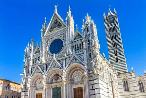 Prints of Facade of Towers Mosaics Cathedral, Siena, Italy. Cathedral completed from 1215 to 1263 Images Dated 2019 January: Facade of Towers Mosaics Cathedral, Siena, Italy. Cathedral completed from 1215 to 1263