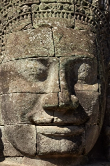 Cambodia Collection: Face thought to depict Bodhisattva Avalokiteshvara, Bayon temple ruins, Angkor Thom