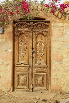 Stucco Prints: Faiyum, Egypt. Wooden door in a wall