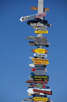 Falkland Island, Stanley (aka Port Stanley). Stanley Totem Pole, colorful directional