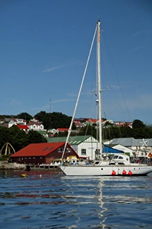 Falkland Island, Stanley (aka Port Stanley). Port area of Stanley. Whalebone Arch in distance