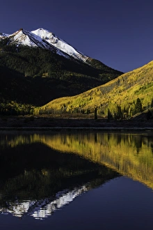 Images Dated 31st January 2016: Fall colors and Red Mountain reflected on Crystal Lake at sunrise, near Ouray, Colorado