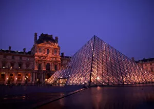 Famous Louvre Museum at Night. Paris, France