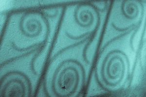 Iron Prints: Fence pattern on a blue wall, Charleston, South Carolina. USA