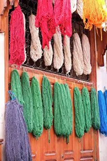 Medina Prints: Fes, Morocco. Skeins of yarn hang to dry after being hand dyed